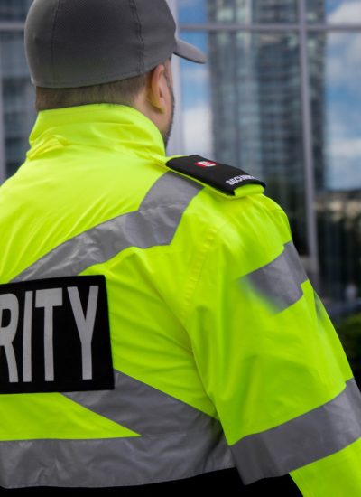 security guard in uniform patrolling residential community security guard in uniform patrolling residential community